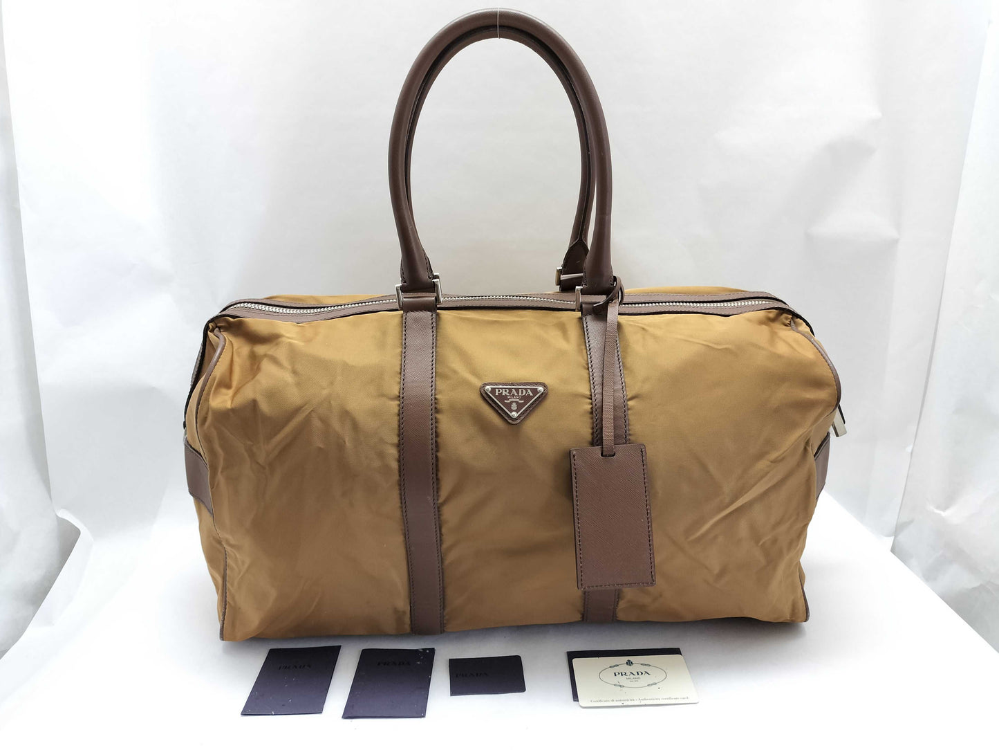 PRADA V19S Triangle Logo Boston Bag in Tessuto Nylon and Saffiano Leather, Brown, Factory Tag 44, Zippered, with Factory Tag #44.