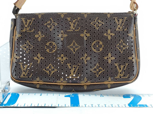 LOUIS VUITTON Monogram Louis Vuitton Perforated Accessory Pouch