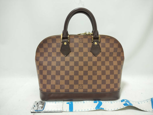 LOUIS VUITTON Damier Alma Handbag