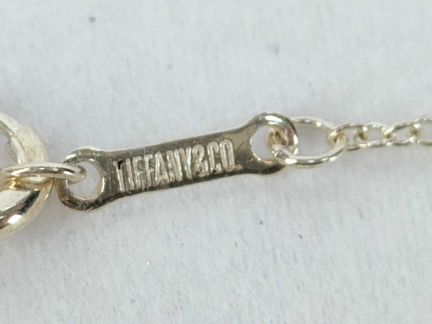 Tiffany & Co. Cross Motif Tiffany Infinity Cross Necklace