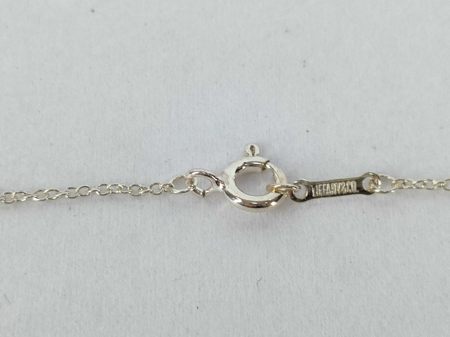 Tiffany & Co. Cross Motif Tiffany Infinity Cross Necklace