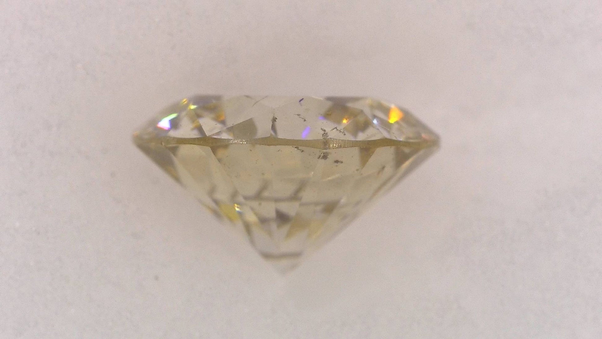 0.551ct UNDER S) LIGHT BROWN SI-2 VERY GOOD/GD/GD FAINT NATURAL 5.34-5.37X3.12mm Loose Diamond