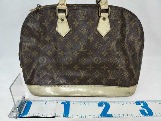 LOUIS VUITTON Monogram Alma Handbag