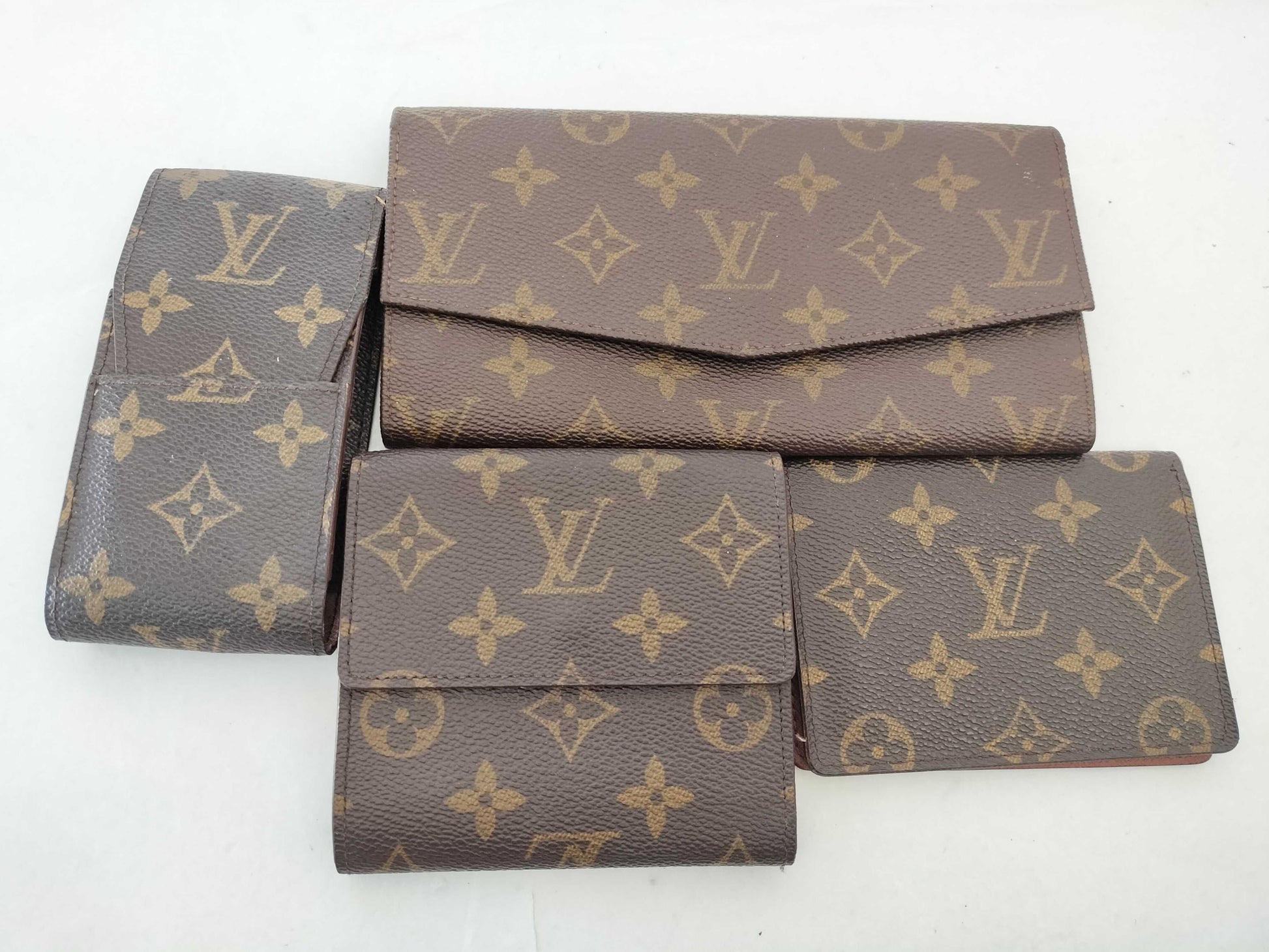 LOUIS VUITTON Monogram Louis Vuitton Monogram Wallet, Pass Case, and 4 Other Items Set
