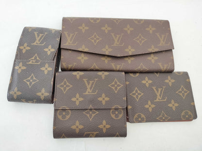 LOUIS VUITTON Monogram Louis Vuitton Monogram Wallet, Pass Case, and 4 Other Items Set