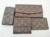 LOUIS VUITTON Monogram Louis Vuitton Monogram Wallet, Pass Case, and 4 Other Items Set