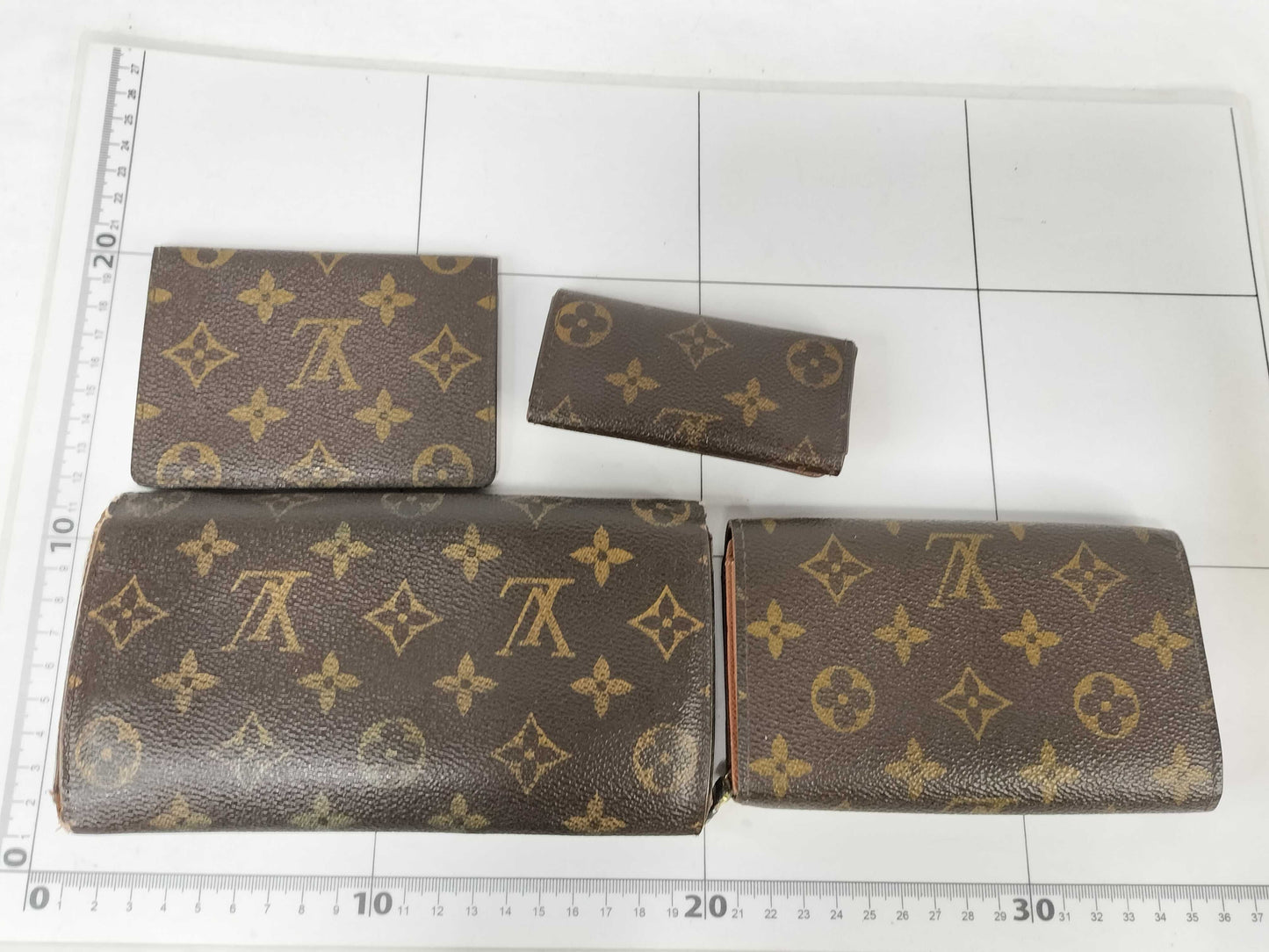 LOUIS VUITTON Monogram Louis Vuitton Monogram Wallet, Key Case, and 4 Other Items Set