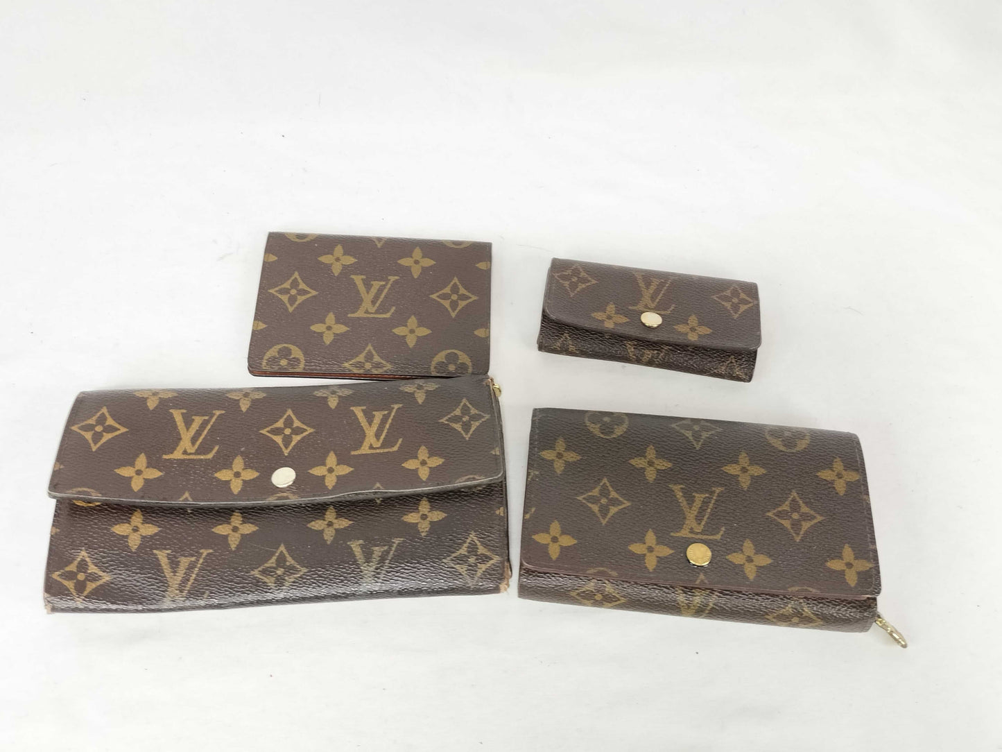 LOUIS VUITTON Monogram Louis Vuitton Monogram Wallet, Key Case, and 4 Other Items Set