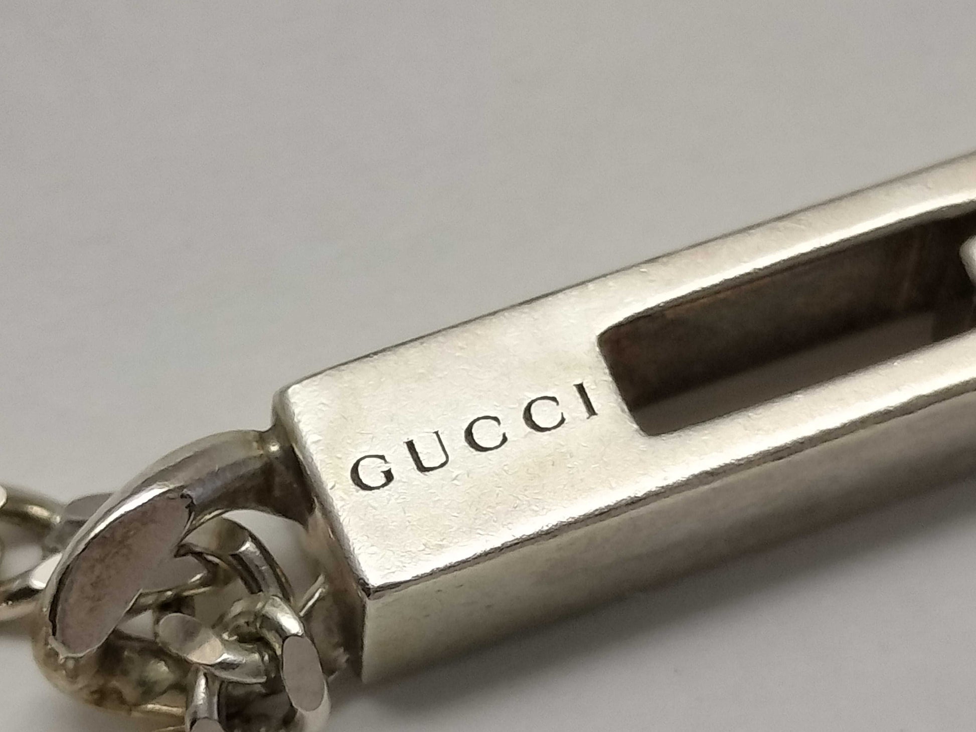 GUCCI 5-piece set including top, earrings, and pendant top