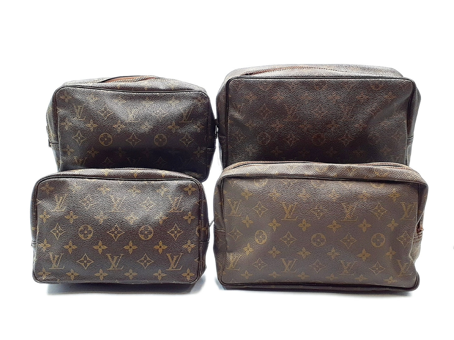 LOUIS VUITTON 4-Piece Monogram True Toilet 28 and True Toilet 23 Pouch Set