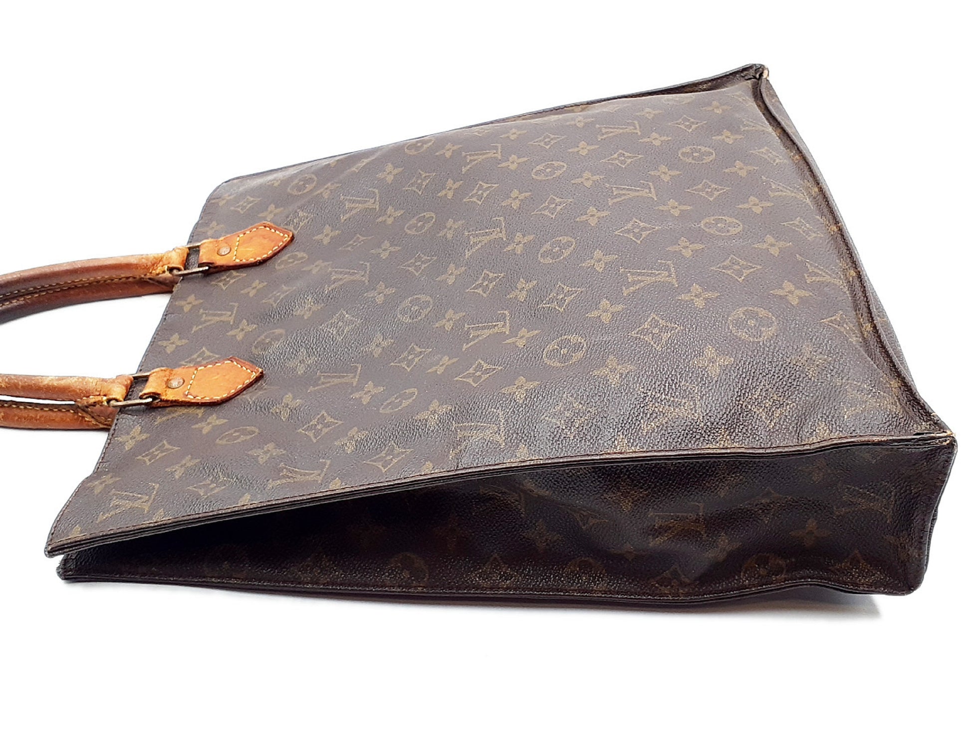 LOUIS VUITTON 4-piece set: Monogram Sac Plat Reporter PM, Pochette Twin GM, and Porte-Document Voyage bag