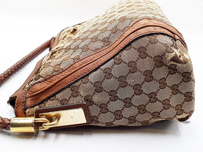 GUCCI 4-piece set: GG canvas, GG crystal, bamboo fringe, and leather tote bag