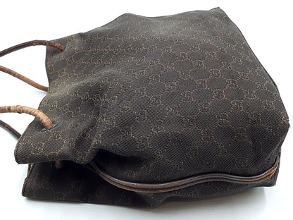 GUCCI 4-piece set: GG canvas, GG crystal, bamboo fringe, and leather tote bag