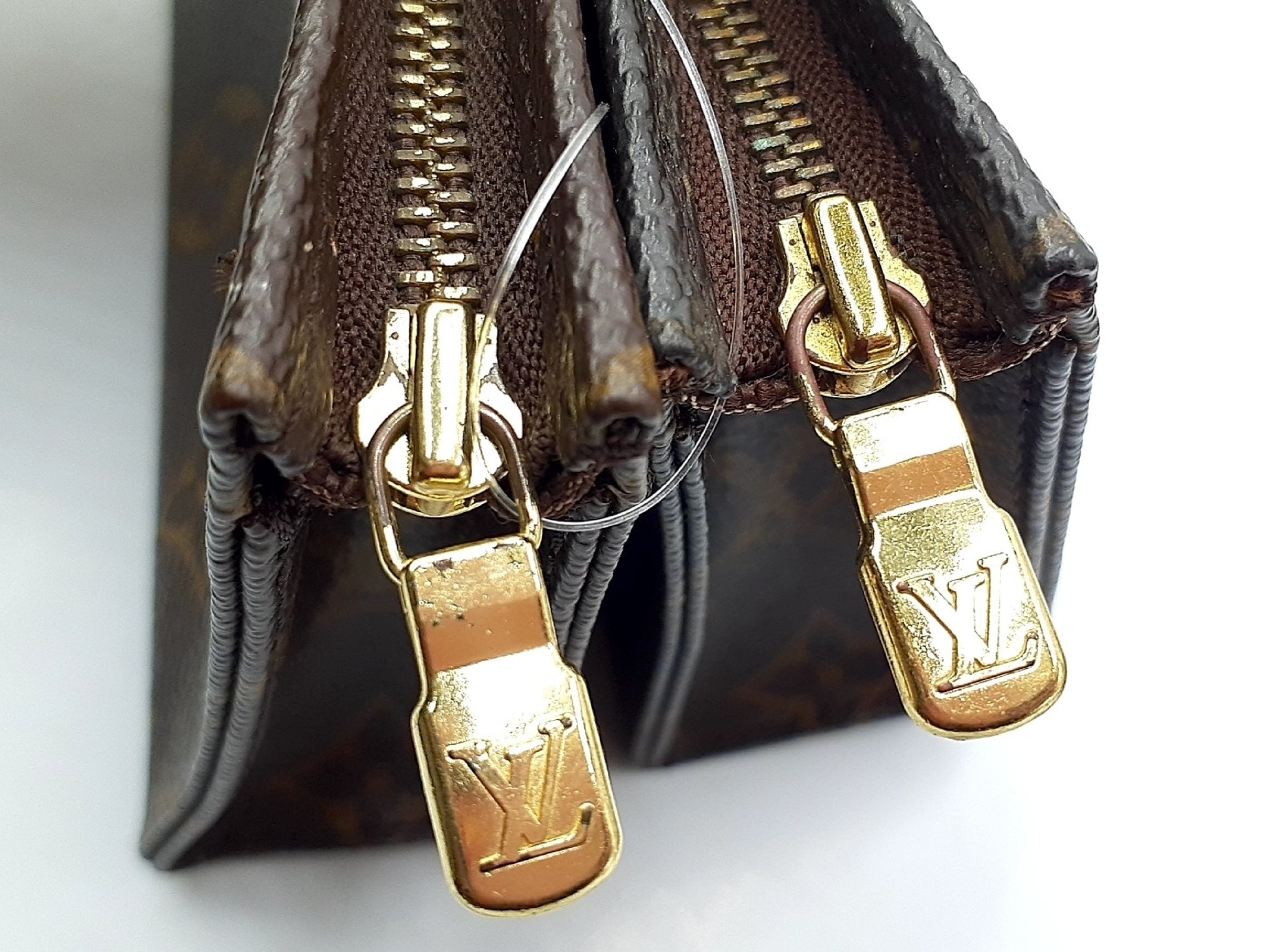 LOUIS VUITTON 3-Piece Monogram Pouch Set: Poche Toilette 15 and Poche Toilette 19