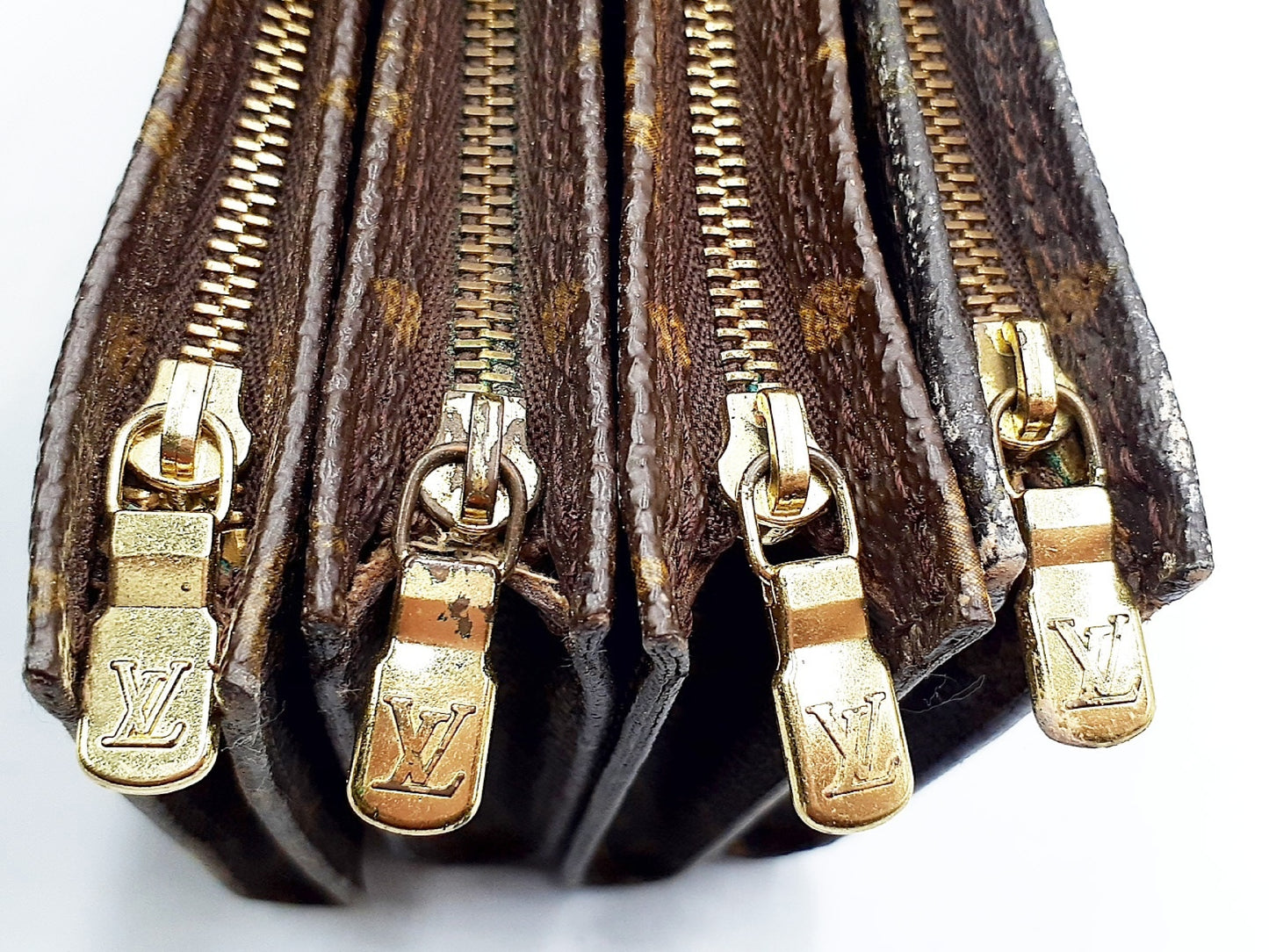 LOUIS VUITTON 4-Piece Monogram Bucket Pouch Set