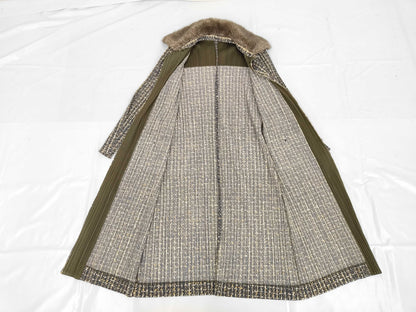 PLEATS PLEASE Issey Miyake long coat with fur collar and shoulder pads, all-over print