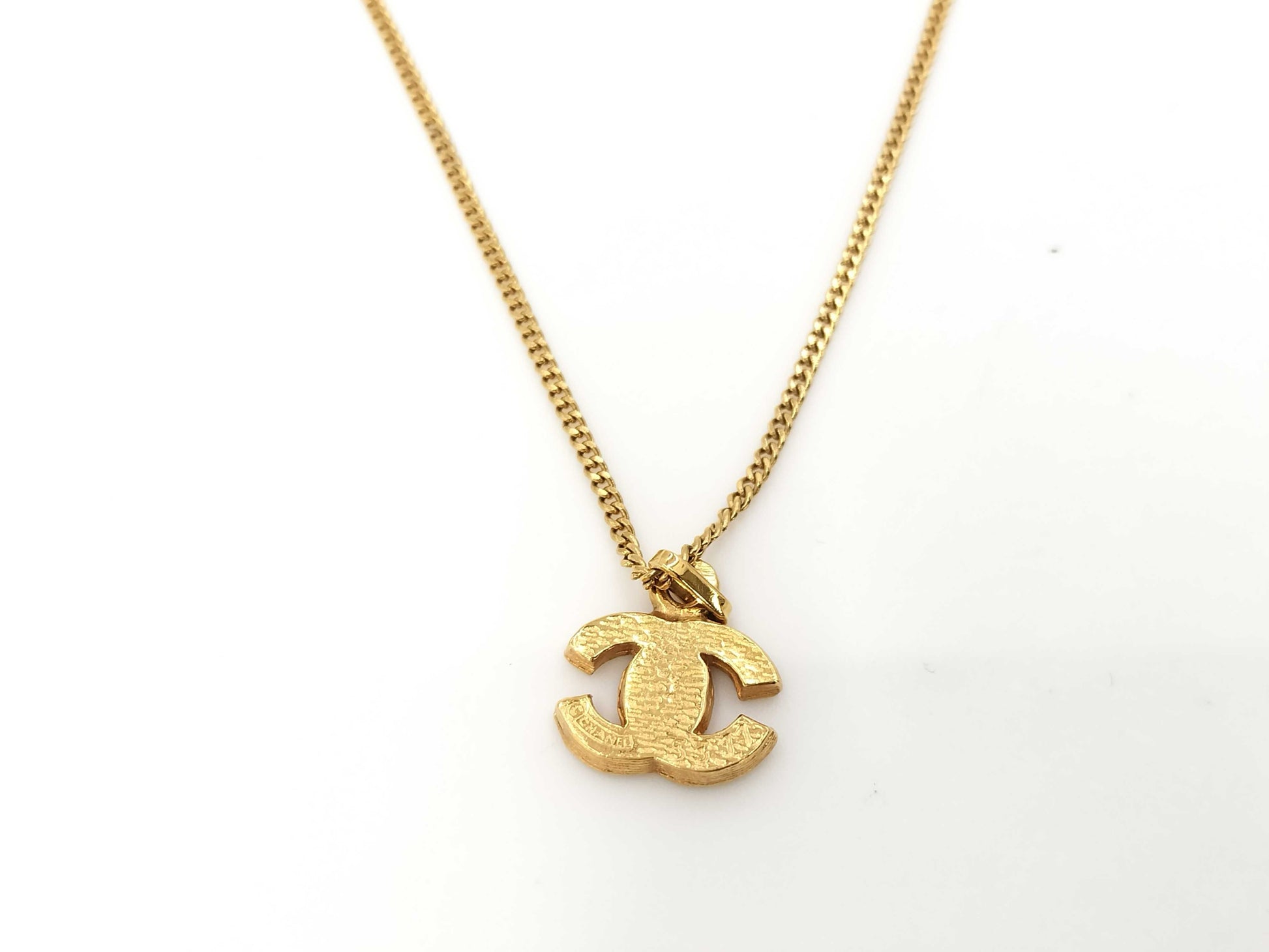 CHANEL 1982 Coco Mark Rhinestone Vintage Necklace in Grand Prix Gold