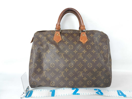 LOUIS VUITTON Monogram LV Speedy Handbag