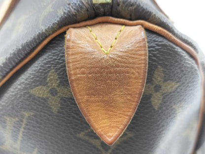 LOUIS VUITTON Monogram Louis Vuitton Speedy 25 Handbag