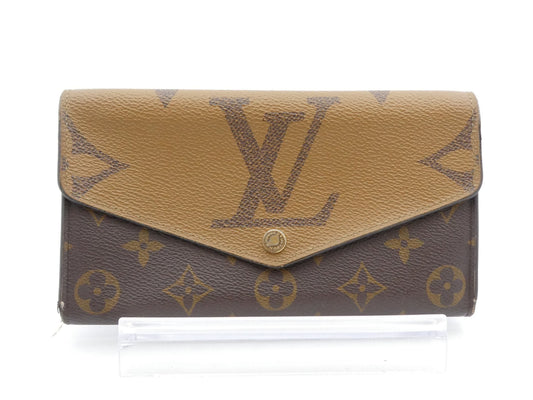 LOUIS VUITTON Monogram Giant Reverse Portefeuille Sarah Wallet with IC Reaction