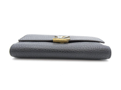 LOUIS VUITTON Portefeuille Capucines Compact Wallet