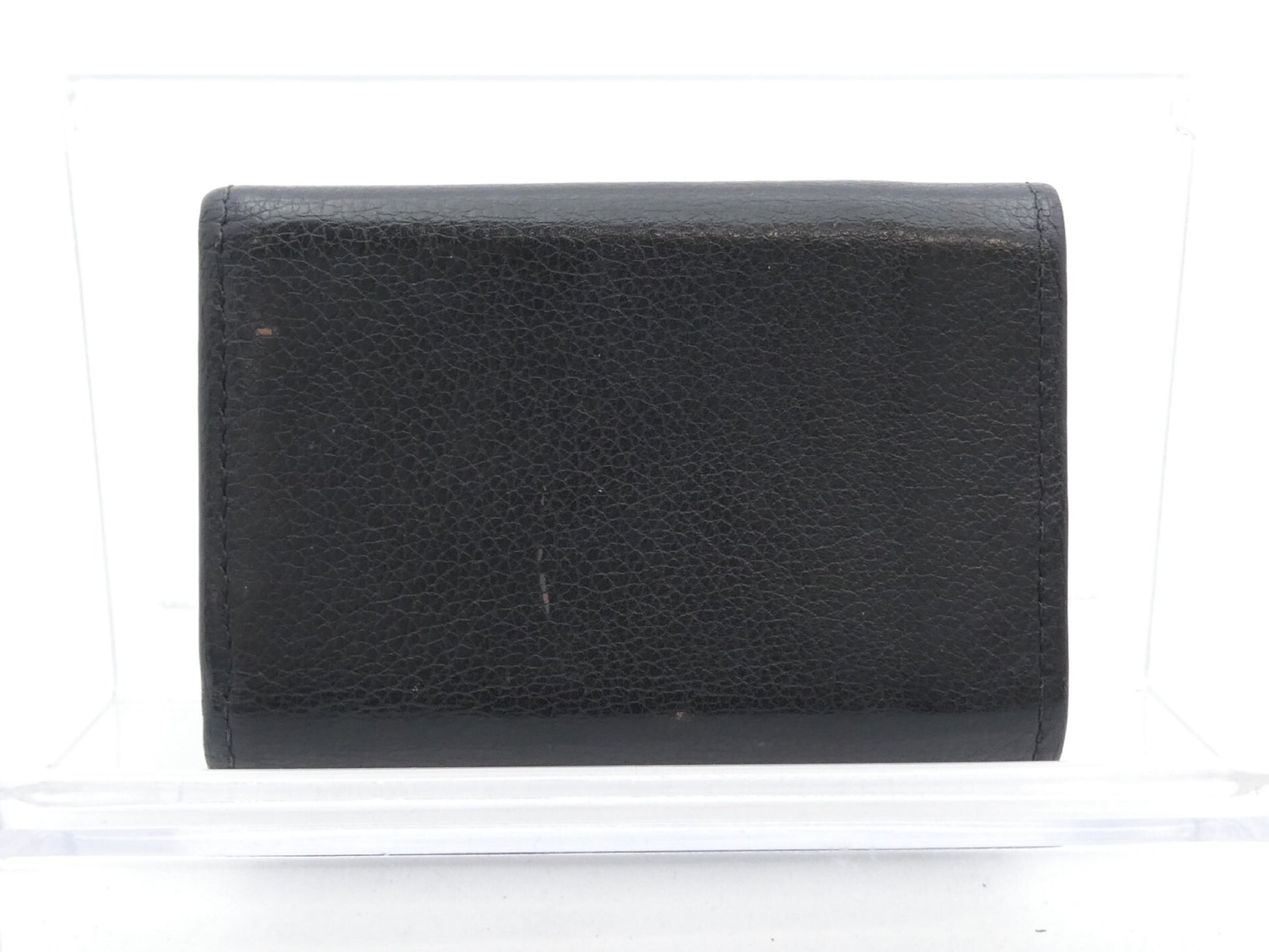LOUIS VUITTON Portefeuille Lock Mini Lockme Wallet
