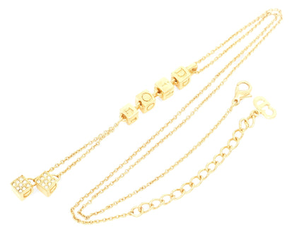 Dior Christian Dior Gold-Colored Rhinestone-Embossed Swing Logo Pendant Necklace, 8.23g