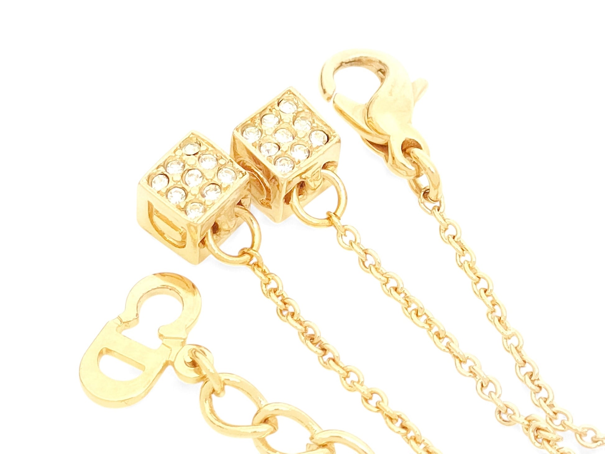 Dior Christian Dior Gold-Colored Rhinestone-Embossed Swing Logo Pendant Necklace, 8.23g