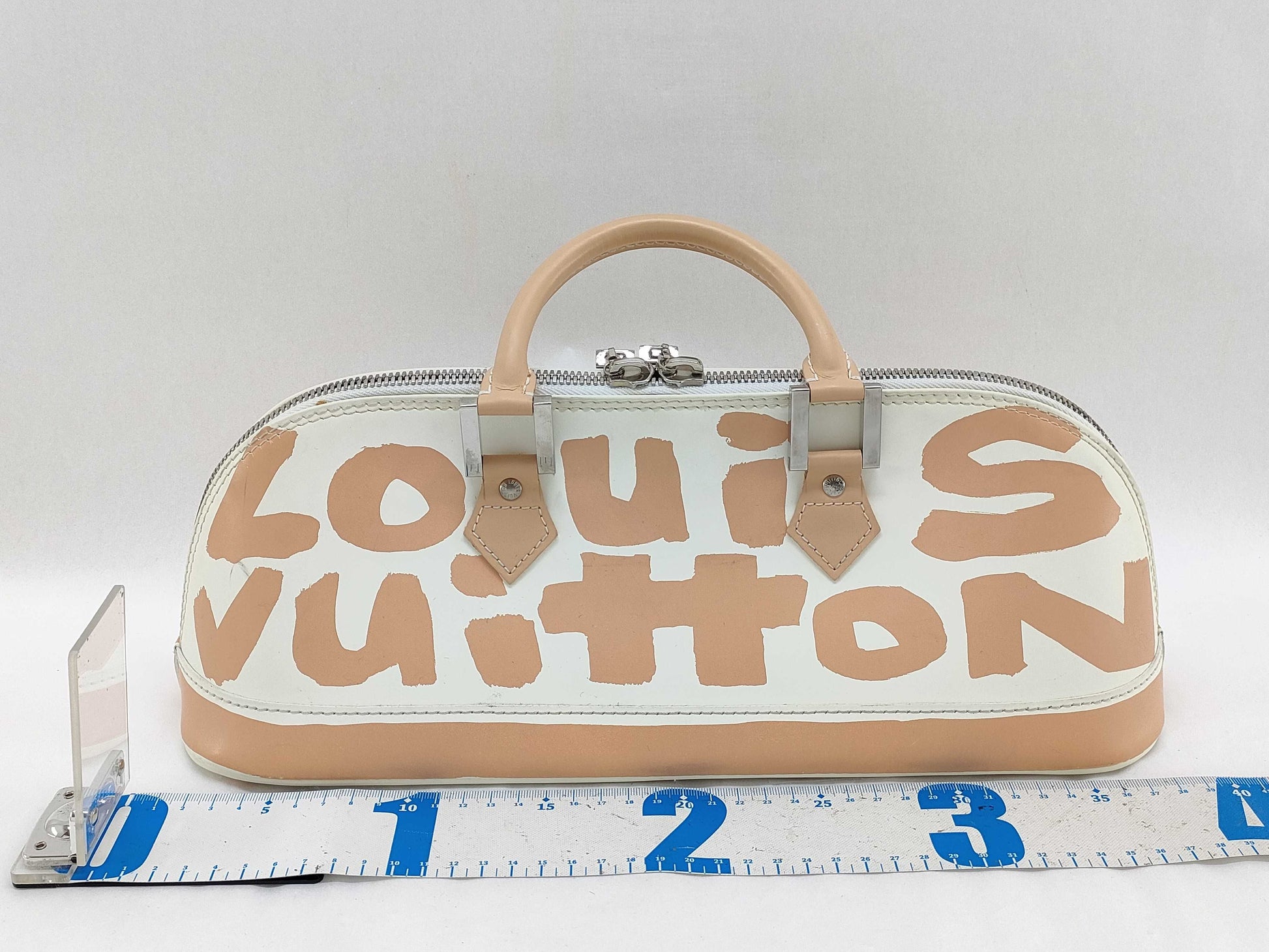 LOUIS VUITTON Alma Horizontal Handbag