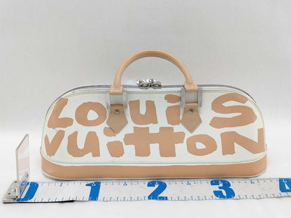 LOUIS VUITTON Alma Horizontal Handbag