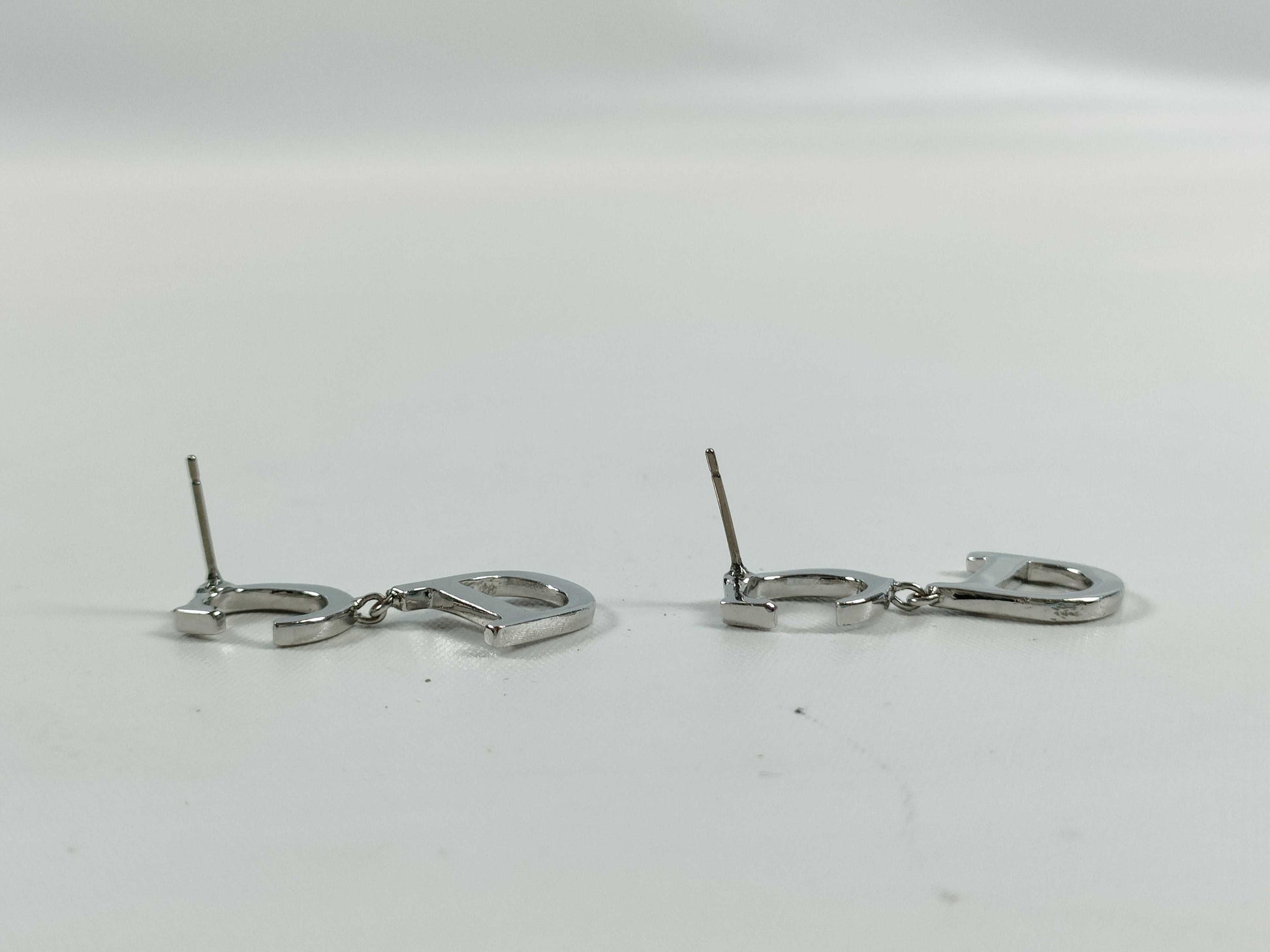 Dior CD logo swing earrings