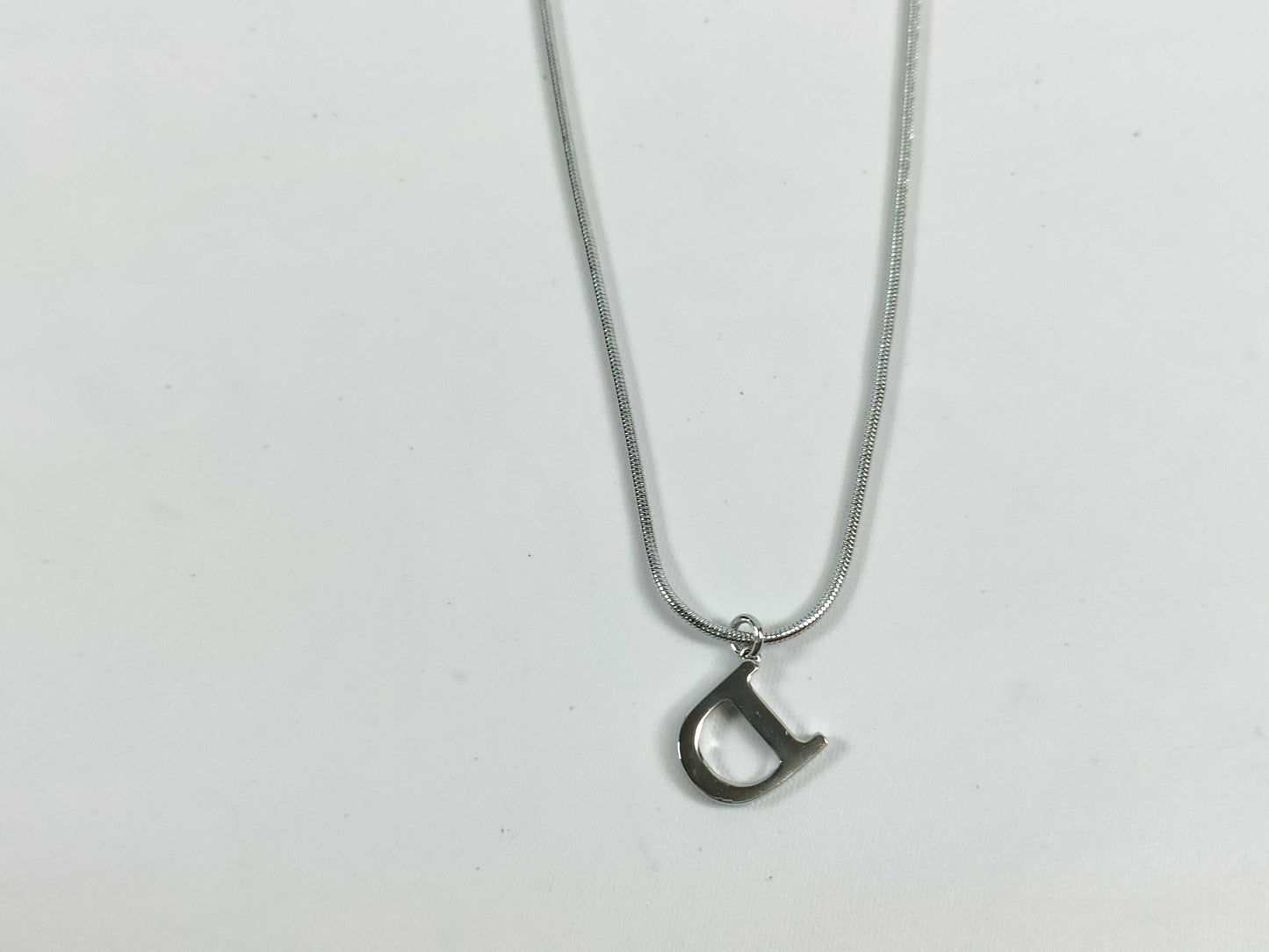 Dior D logo necklace