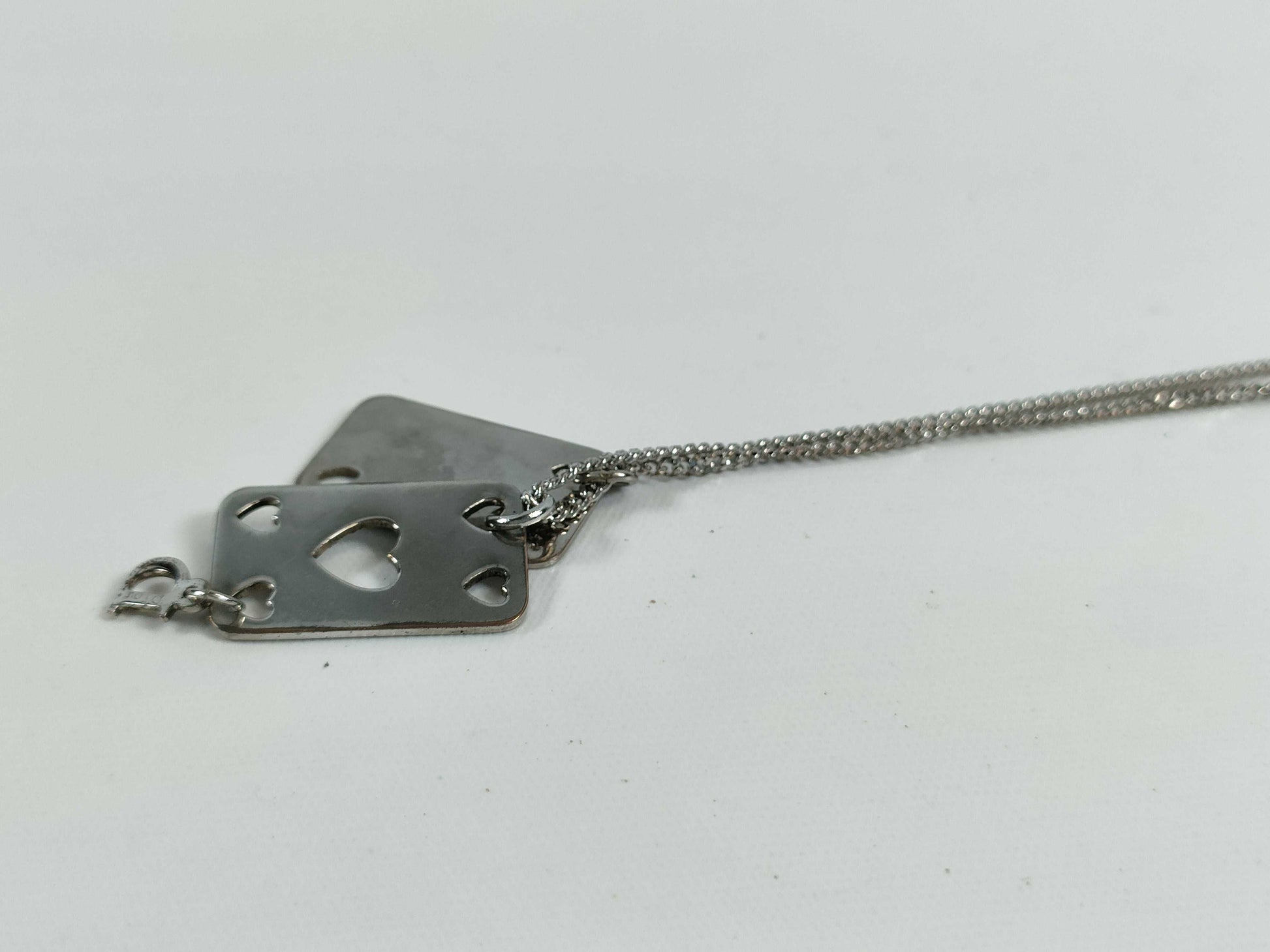 Dior D logo playing card plate necklace