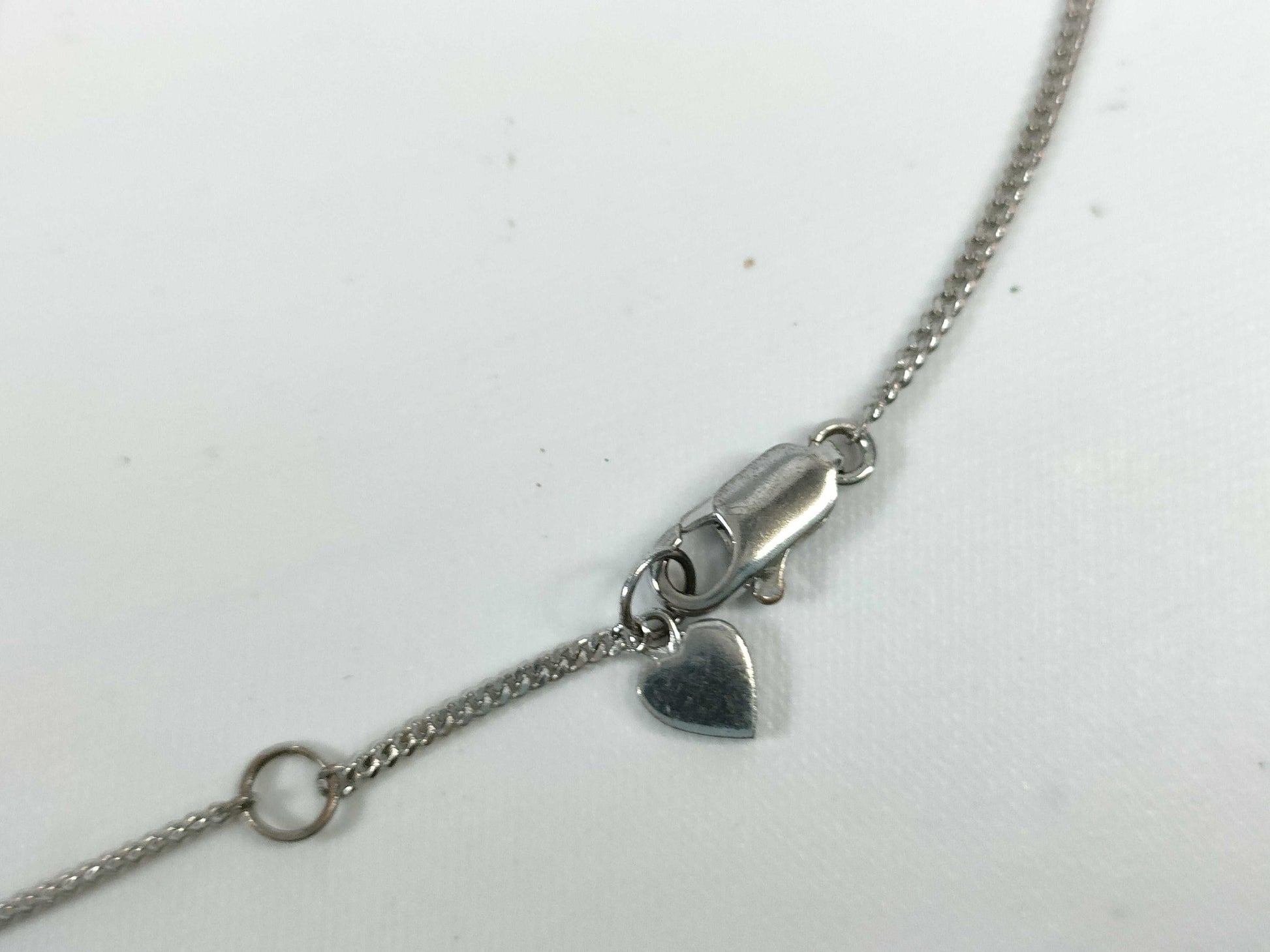 Dior D logo playing card plate necklace