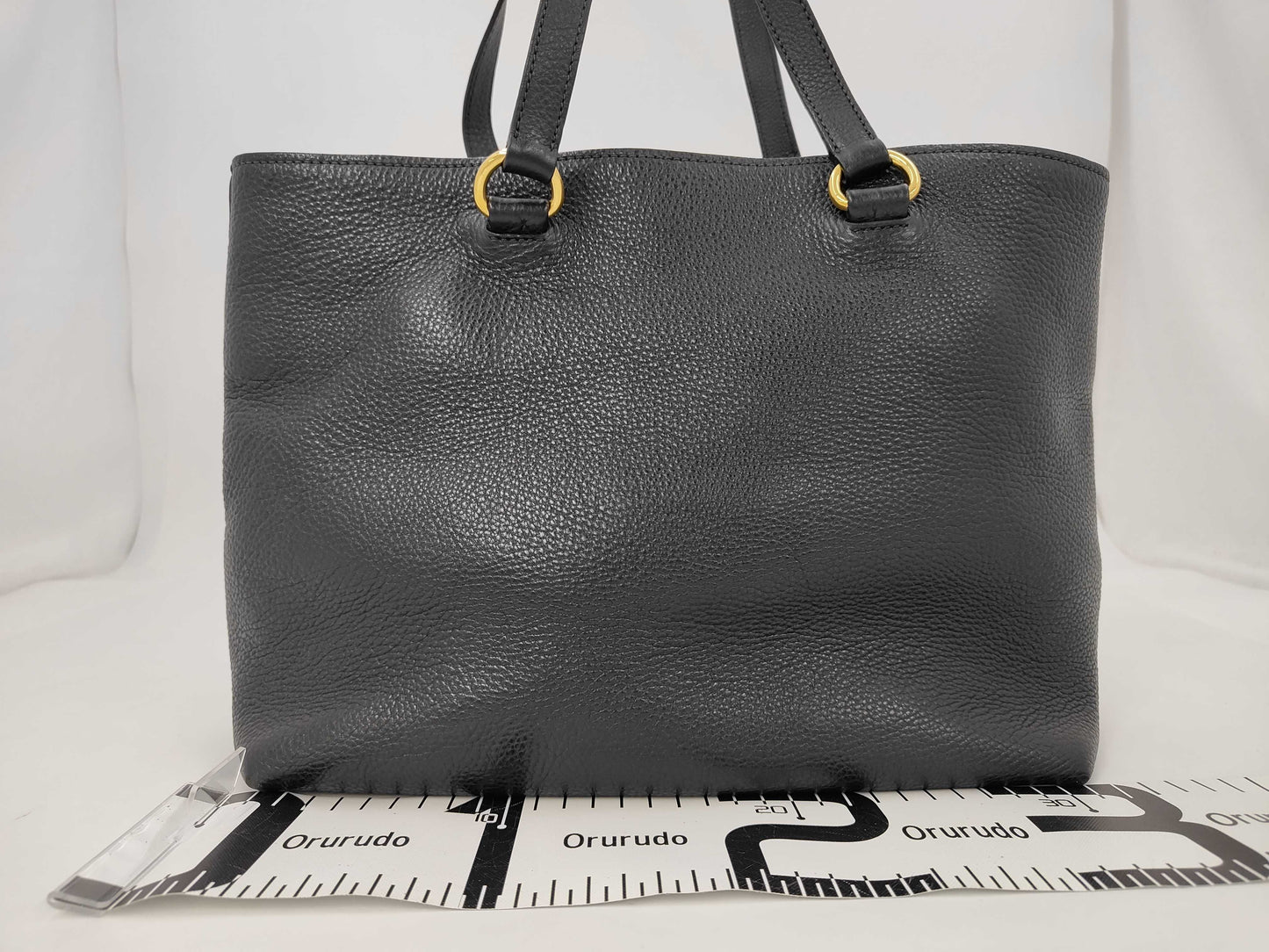 PRADA Prada logo embossed leather tote bag