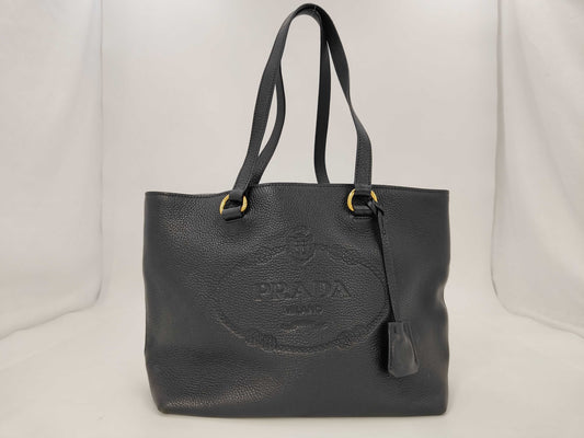 PRADA Prada logo embossed leather tote bag