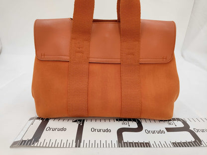 HERMES Toile Chevron/Leather Valparaiso PM. Accessories: Pouch and Tote Bag.