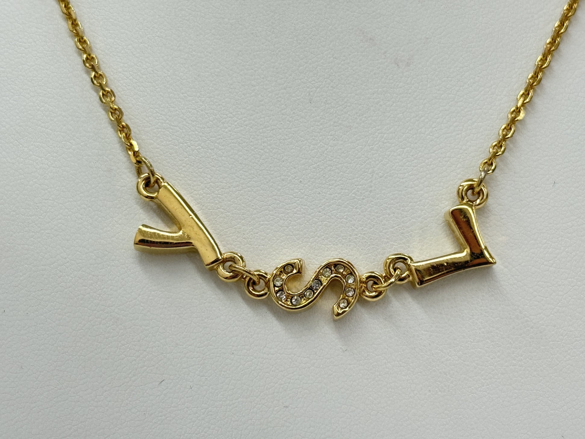 Yves Saint Laurent logo design gold necklace