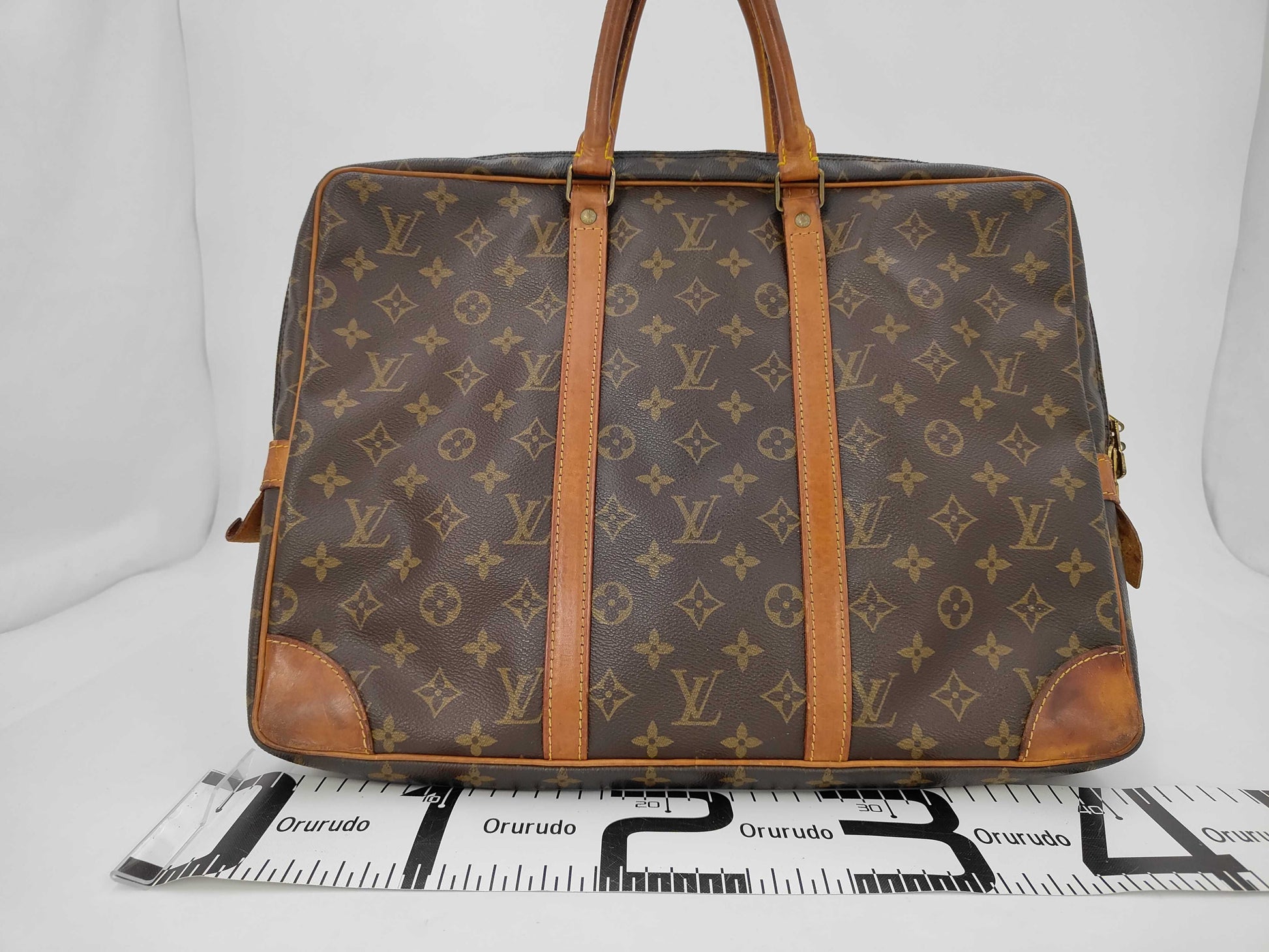 LOUIS VUITTON Monogram Porte-Document Voyage Handbag