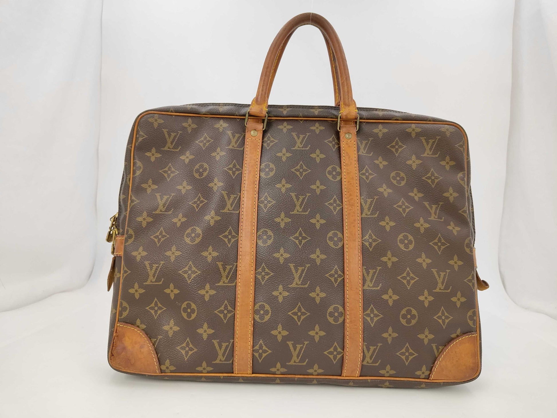 LOUIS VUITTON Monogram Porte-Document Voyage Handbag
