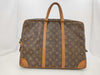 LOUIS VUITTON Monogram Porte-Document Voyage Handbag