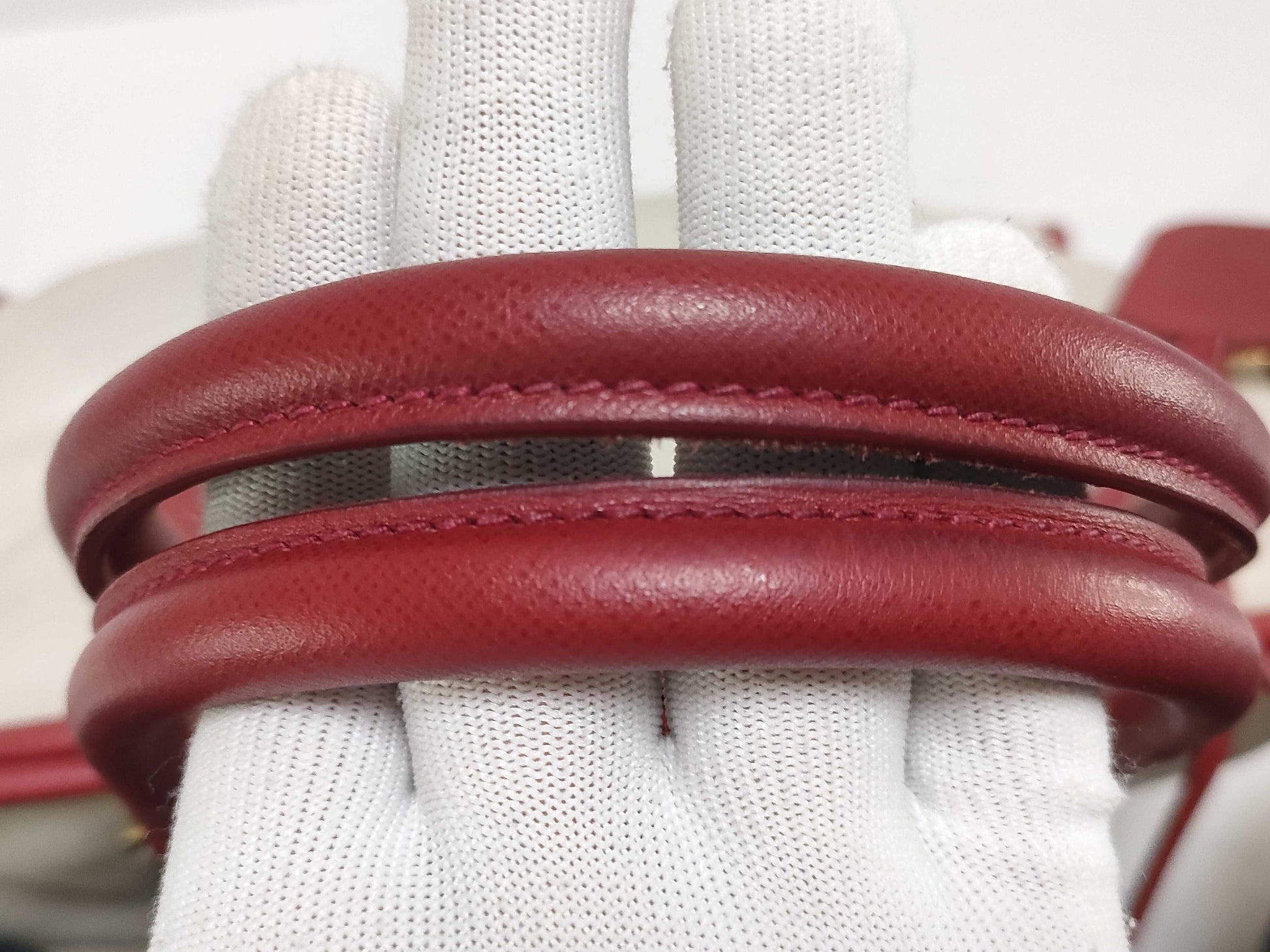 PRADA BN2578 Bicolor Saffiano Leather Handbag in Red and White, with Shinjuku Isetan Warranty, Cloche, and White Tag.