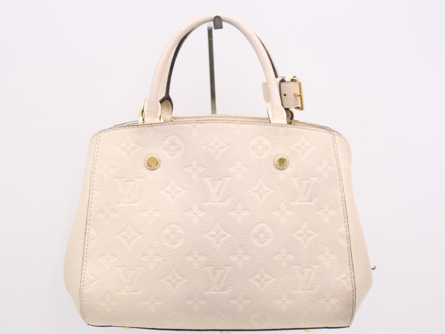 LOUIS VUITTON M50880 Empreinte Montaigne BB White Handbag with Shoulder Strap, Padlock, Two Keys, Cloche, and Poignier Closure