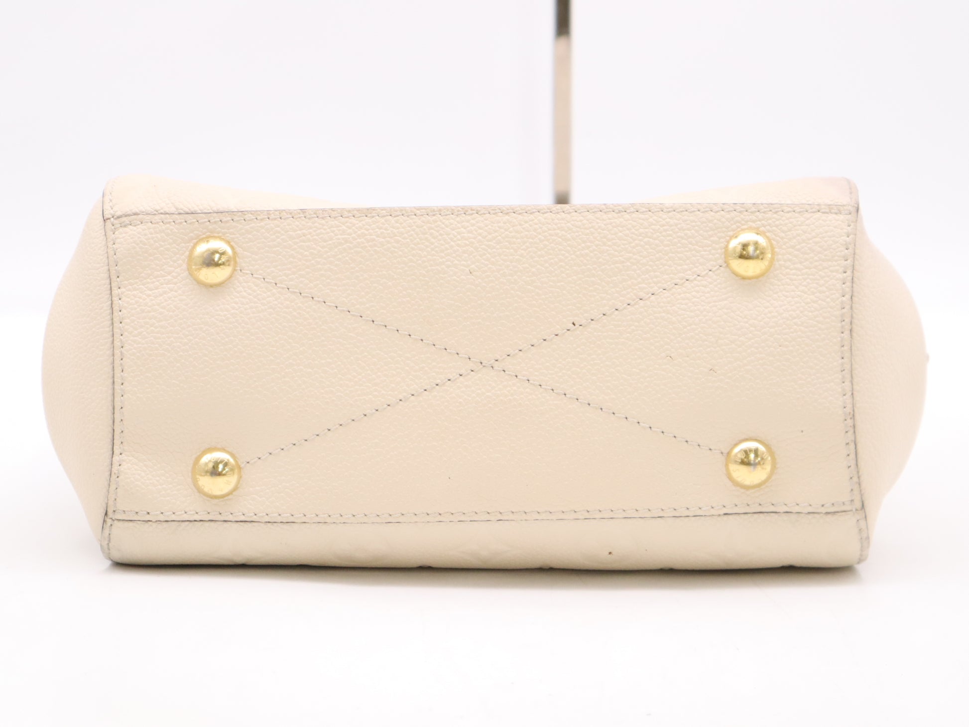 LOUIS VUITTON M50880 Empreinte Montaigne BB White Handbag with Shoulder Strap, Padlock, Two Keys, Cloche, and Poignier Closure