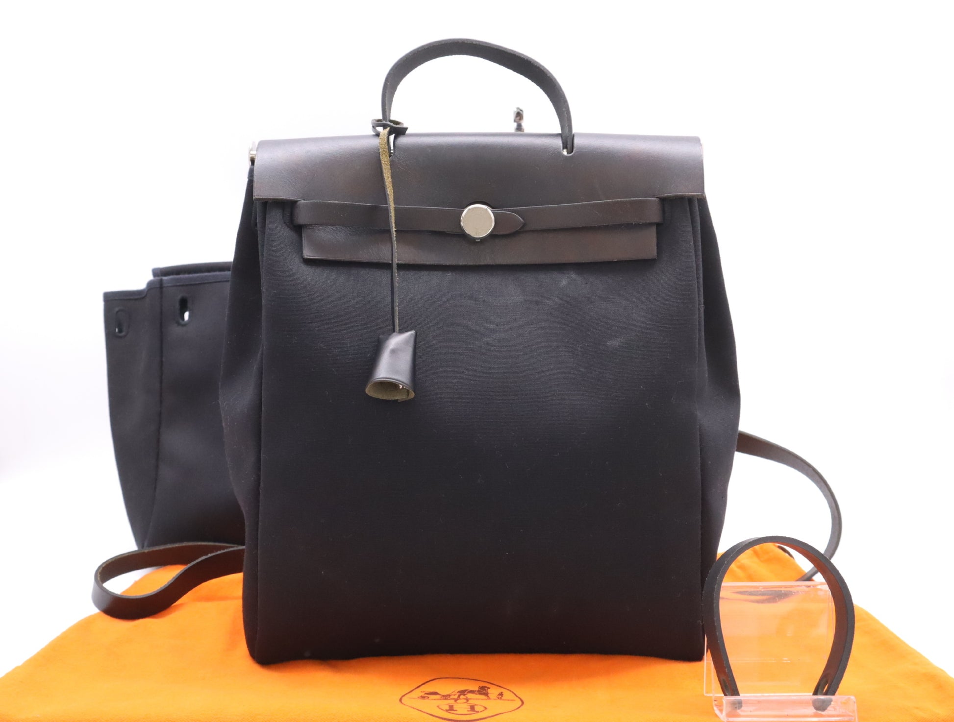 HERMES Toile Officier Air Bag, Ad PM, with padlock, two keys, clochette, and two dust bags, black, silver hardware, G stamp, 2003, handbag