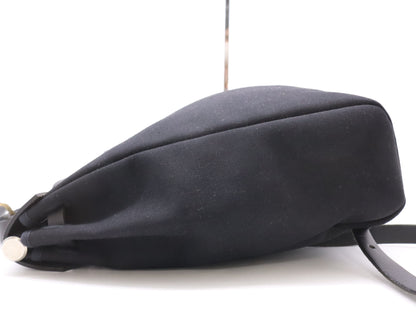 HERMES Toile Officier Air Bag, Ad PM, with padlock, two keys, clochette, and two dust bags, black, silver hardware, G stamp, 2003, handbag