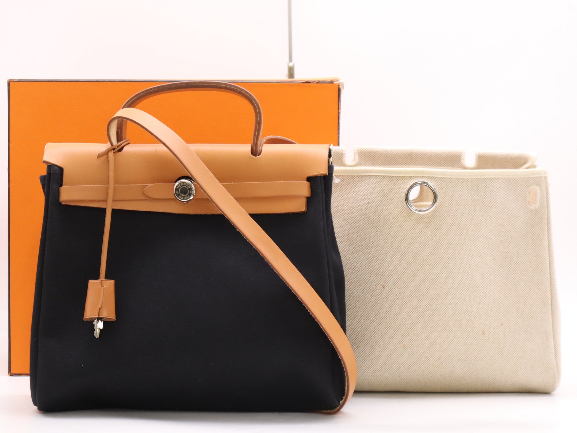 HERMES Toile Officier x Leather Air Bag PM in Natural, Beige, and Black. Includes spare bag, padlock, two keys, a clochette, and a box. Also includes an F stamp and a 2002 shoulder bag.