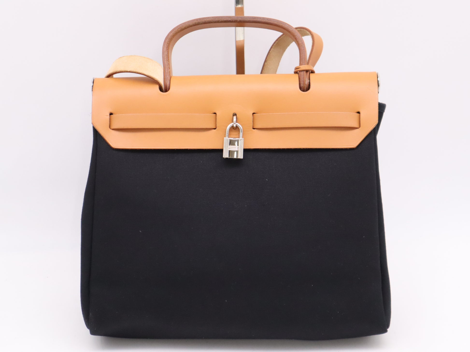 HERMES Toile Officier x Leather Air Bag PM in Natural, Beige, and Black. Includes spare bag, padlock, two keys, a clochette, and a box. Also includes an F stamp and a 2002 shoulder bag.