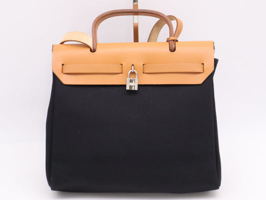 HERMES Toile Officier x Leather Air Bag PM in Natural, Beige, and Black. Includes spare bag, padlock, two keys, a clochette, and a box. Also includes an F stamp and a 2002 shoulder bag.