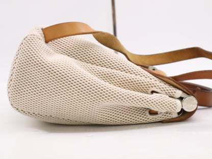 HERMES Toile GM x Leather Air Bag Ad PM Backpack in Brown, Beige, and Natural. Includes a padlock, two keys, a dust bag, and a box. H stamped. 2004.